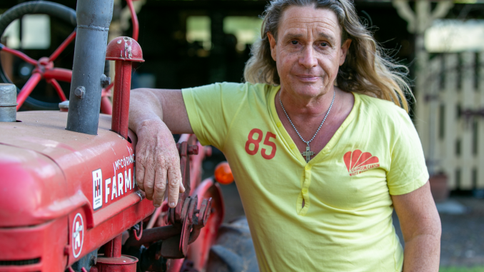When Phil Day isn’t tending the gardens around town, where he works as a Council horticulturalist, you’ll find him in his garden at home, tinkering with tractors, busy with the grandkids or making award-winning cartoons.