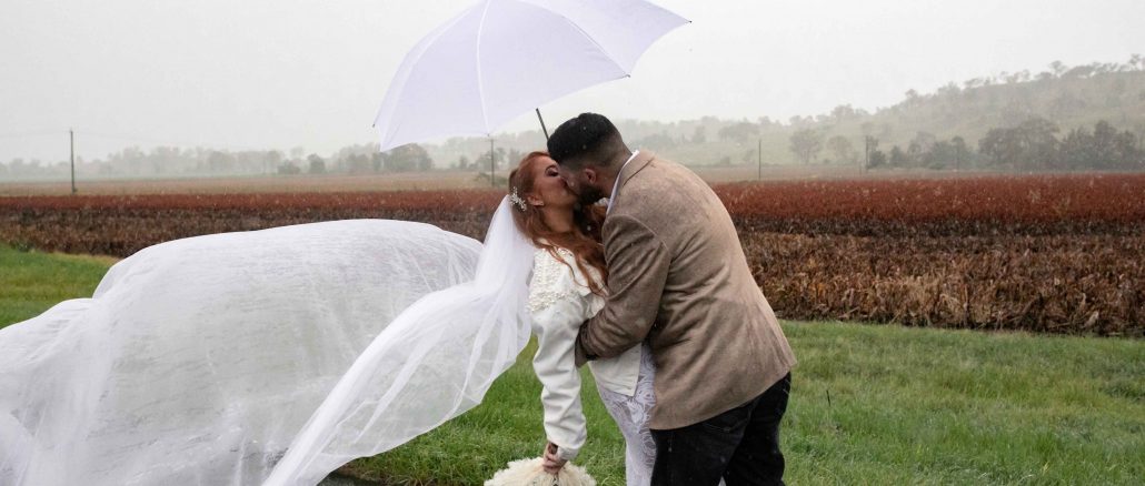 Newlyweds Erin and Scott Keys celebrate their rainy wedding at Kerry. Photo by Gemma Nevin Photography.