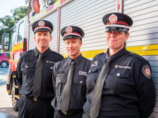Graduating auxiliary firefighters Mark Doble, Chris Peterson and Jesse McLennan