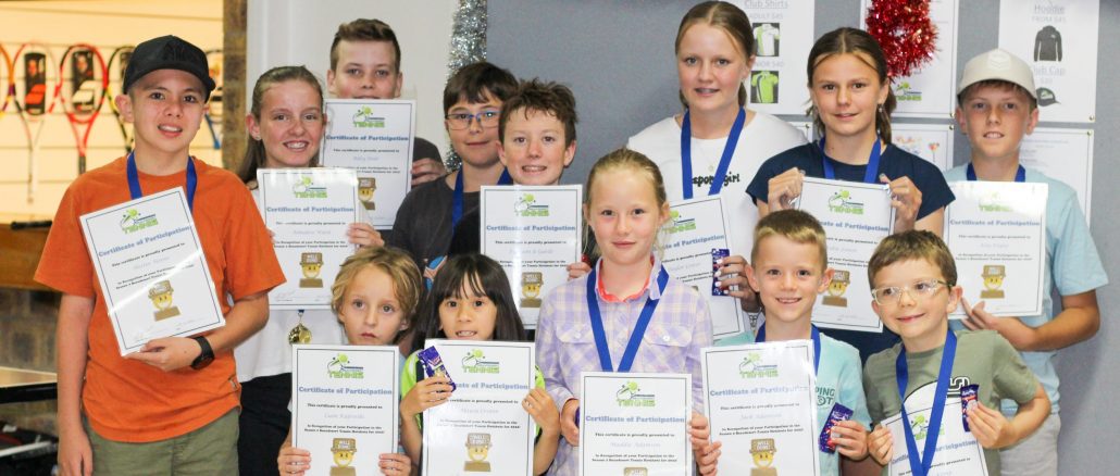 Beaudesert & District Tennis Association juniors receive their certificate of participation.