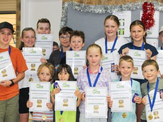 Beaudesert & District Tennis Association juniors receive their certificate of participation.