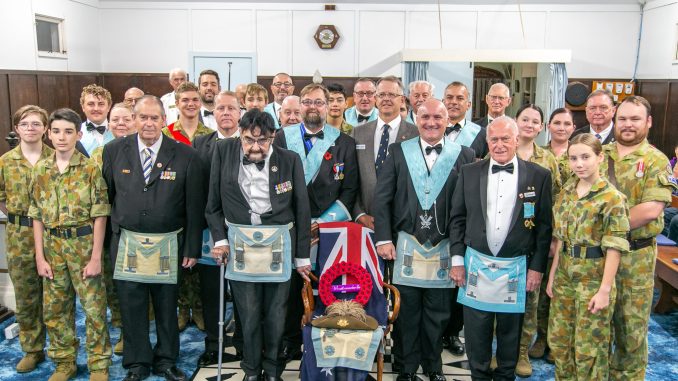 Beaudesert Freemasons, Australian Army Cadets and Deputy Mayor Jeff McConnell (to right of chair). Photo by Susie Cunningham.