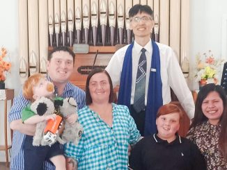 Rev Dr JeCheol Cook and new members, the Lloyd family and Fritzie Perocho