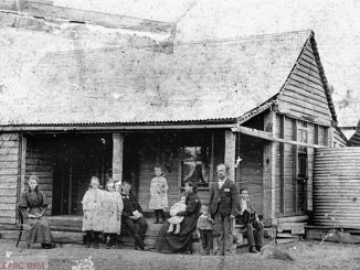 Moloney family outside their home at Bromelton