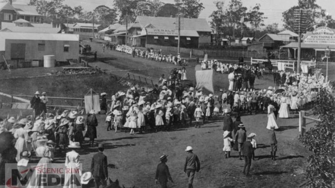 Empire Day procession on the corner of Brisbane and William Streets Beaudesert 1908. Image supplied.