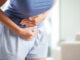 Abdominal pain is one sign of early onset bowel cancer.