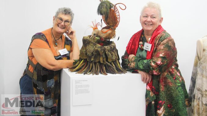 Shannon Hunter and Polly Cameron with their combined work. Photo by Keer Moriarty.