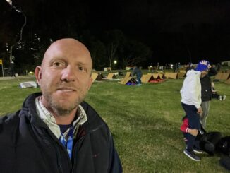 CARDBOARD CITY: Jamie Douglas traded his home for a cardboard one in the open air at Riverstage recently as part of the Vinnies CEO Sleepout charity night.