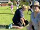 BDNA President Susan Wynne with volunteers repairing the netball grounds.