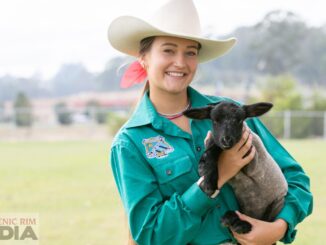 Layne Addy and Patrick the poddy lamb