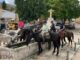 Riders stop in a Spanish town